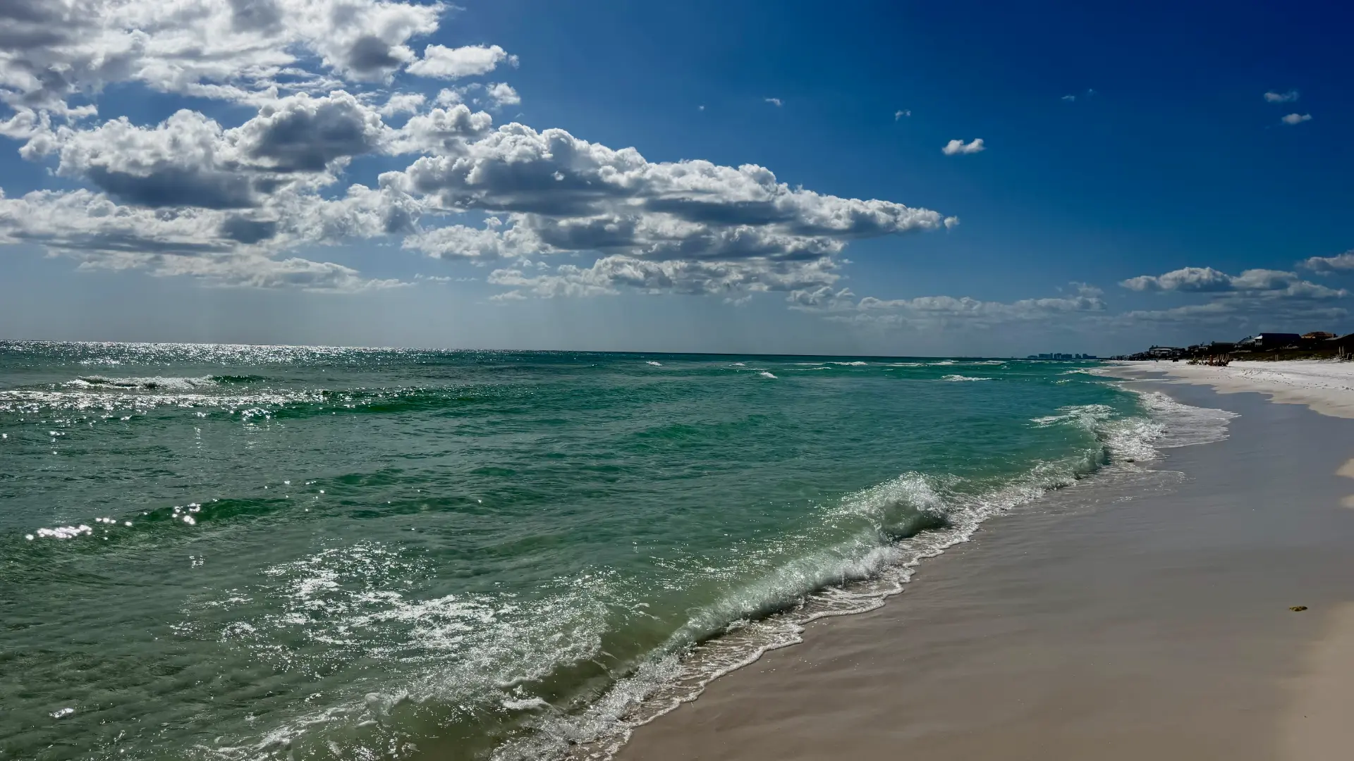 Sugar-white sand, sea oats and emerald Gulf water on Adagio's private beach at Adagio 30A