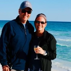 Doug and Val on the beach in front of the gulf